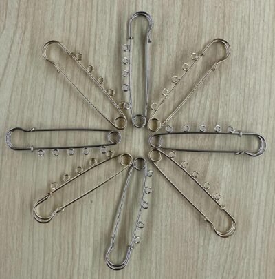 Baby pin brooch